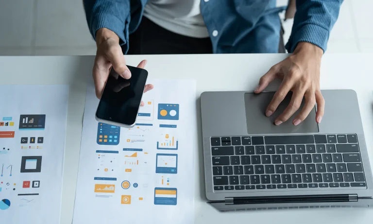 Student working on a laptop with analytics charts while exploring tech tools for productivity.